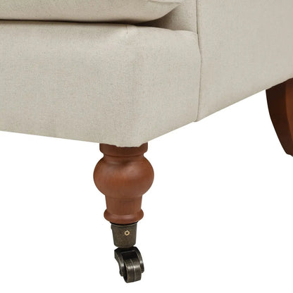 Alana Lawson Accent Arm Chair with beige upholstery, wood bun legs and casters on Tampa Home & Garden Store