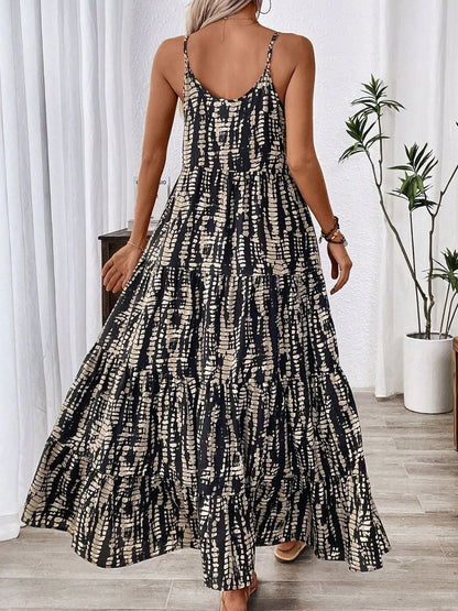 Stevvex black printed maxi dress with beige pattern, spaghetti straps, tiered skirt on Tampa Home & Garden Store