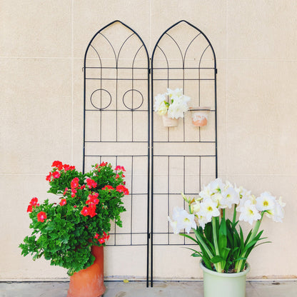 4 Pack Metal Garden Trellis black iron arches; two planters with red and white flowers on Tampa Home & Garden Store