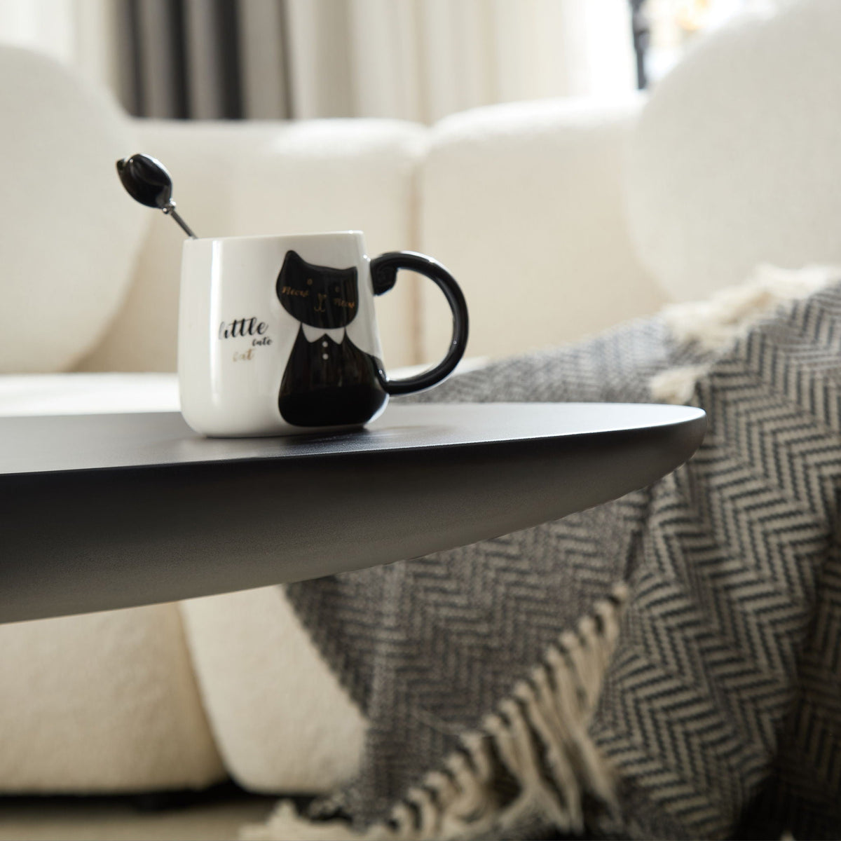 Lucky Stone Shaped End Table with Sculptural Base, dark round top, mug with mustache on Tampa Home & Garden Store