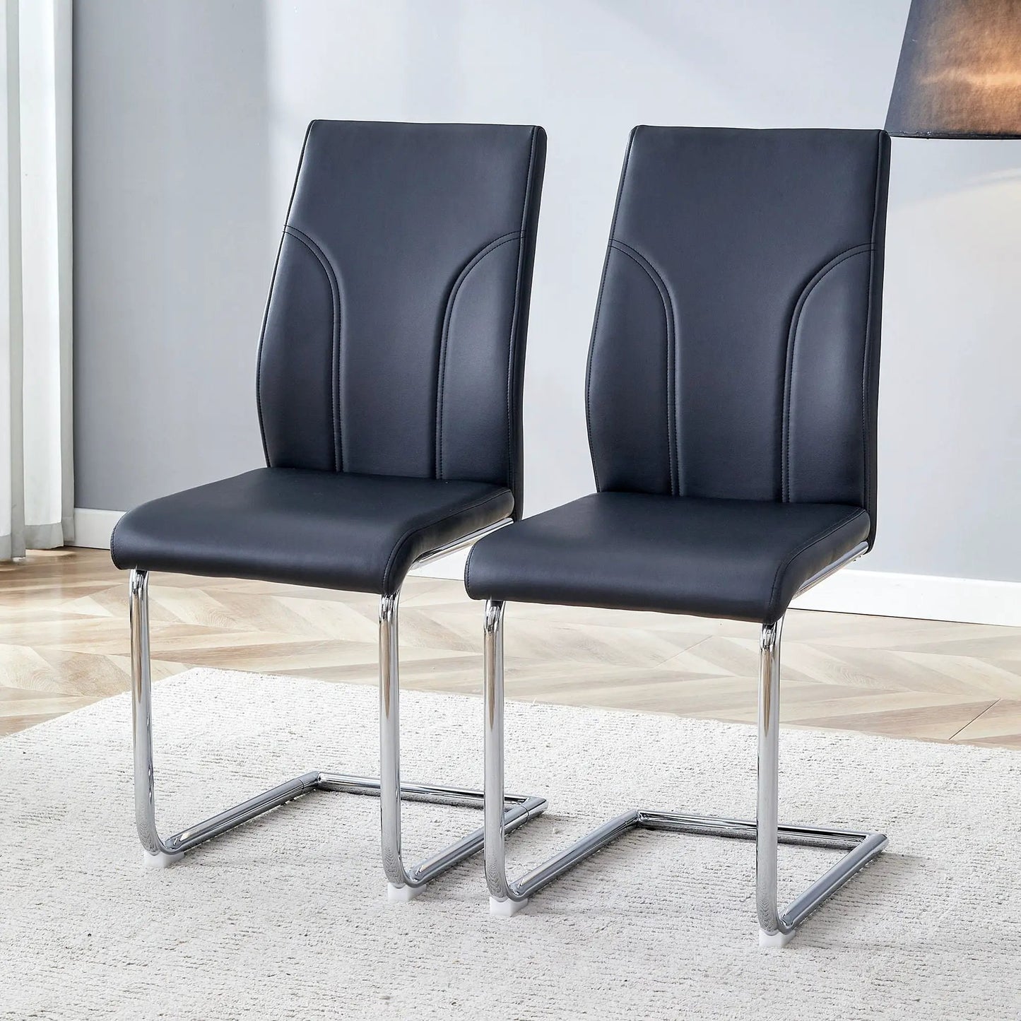 Modern dining chairs in black faux-leather with high backs and chrome cantilever legs, set of 2 on Tampa Home & Garden Store