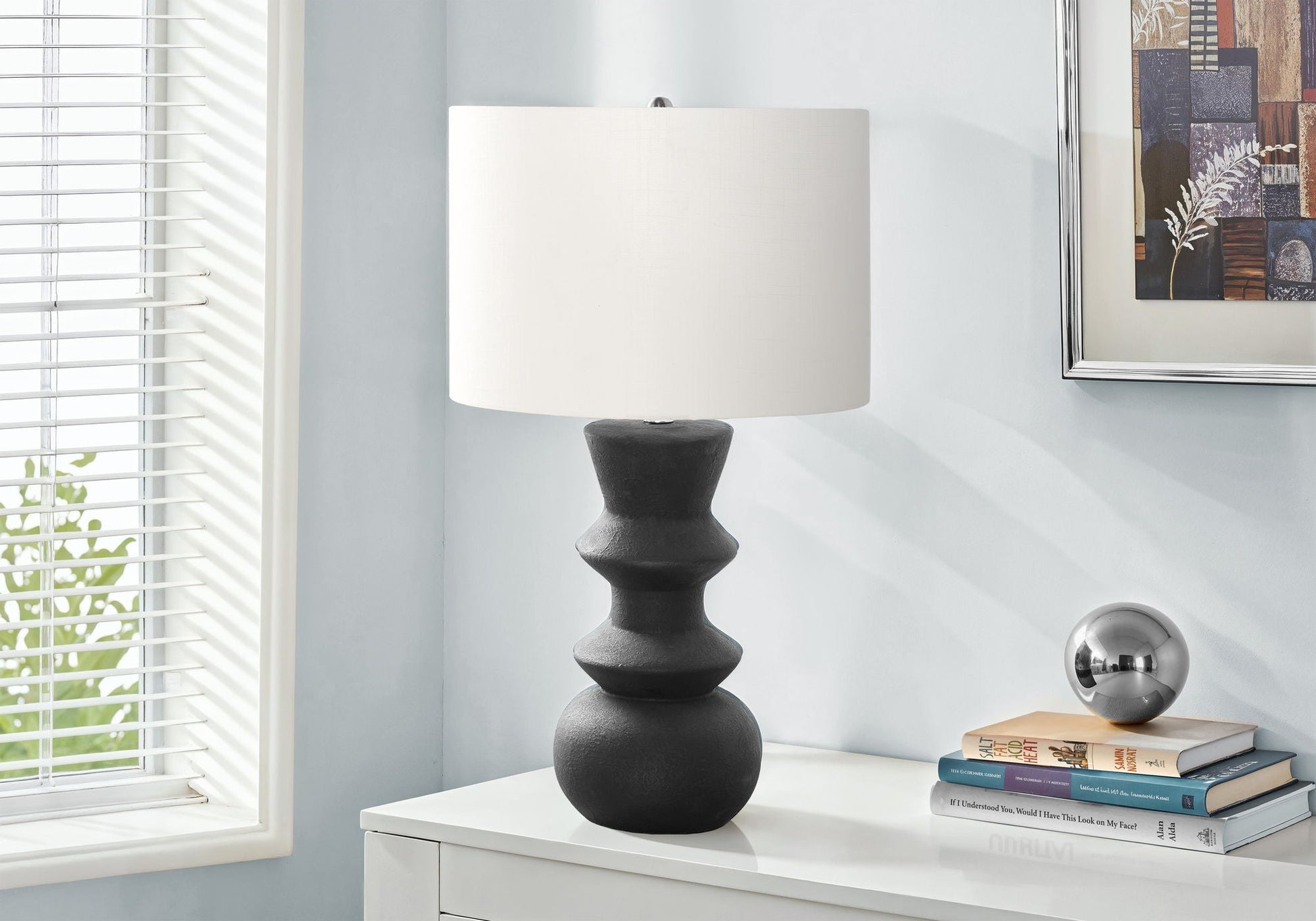 Lighting, Ceramic, Contemporary Table Lamp with a black stacked ceramic base and white drum shade on Tampa Home & Garden Store