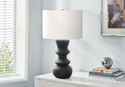 Lighting, Ceramic, Contemporary Table Lamp with a black stacked ceramic base and white drum shade on Tampa Home & Garden Store