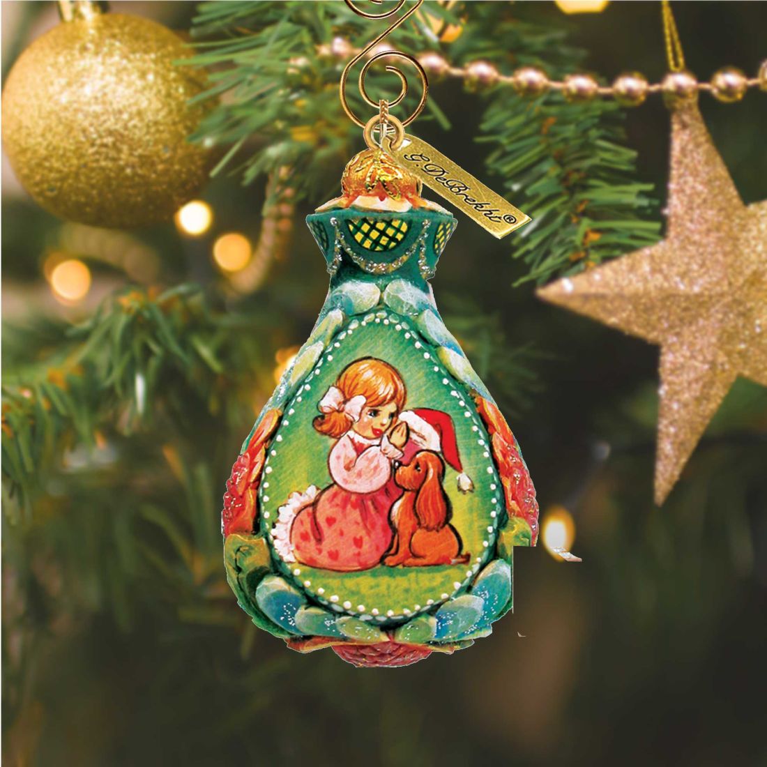 Secret Santa Sculpted Hand-Painted Christmas Ornament by G.DeBrekht with girl and dog in green on Tampa Home & Garden Store