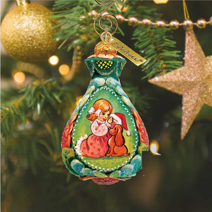 Secret Santa Sculpted Hand-Painted Christmas Ornament by G.DeBrekht with girl and dog in green on Tampa Home & Garden Store