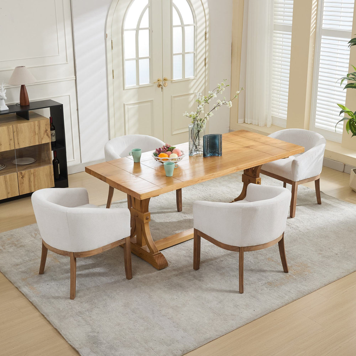 Mid Century Modern upholstered barrel dining chairs with arms in white fabric and wood legs on Tampa Home & Garden Store