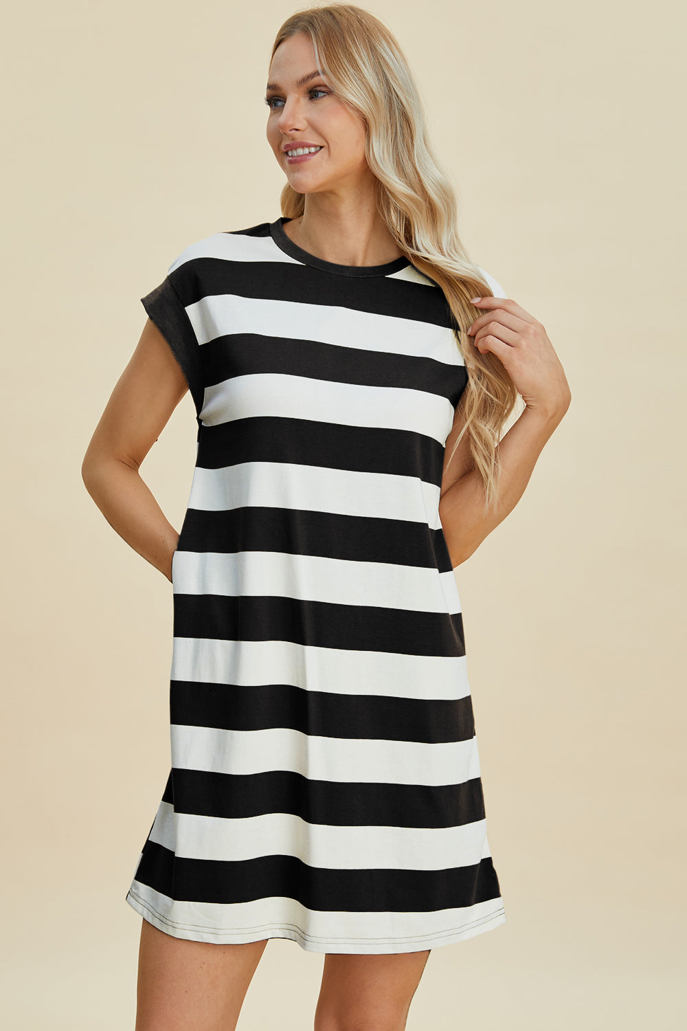 Stevvex striped round-neck cap-sleeve mini dress in black and white on model on Tampa Home & Garden Store