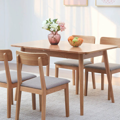 Round corner telescopic dining table for 6–8 with diagonal legs by Unique Piece Furniture on Tampa Home & Garden Store