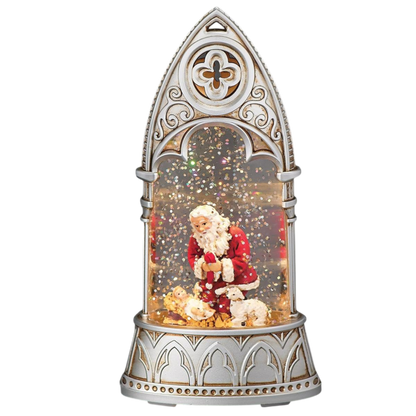 Lighted kneeling Santa arch waterglobe by The Country Christmas Loft in an ornate silver frame with glittery confetti on Tampa Home & Garden Store