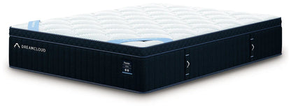 DreamCloud Premier Hybrid mattress with navy quilted sides and white dotted top on Tampa Home & Garden Store