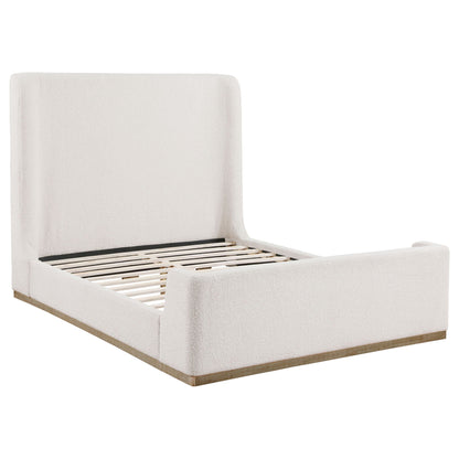 Vindra Queen Sleigh Bed cream upholstery by HouseOfZazla; cream upholstered bed frame with light wood base on Tampa Home & Garden Store