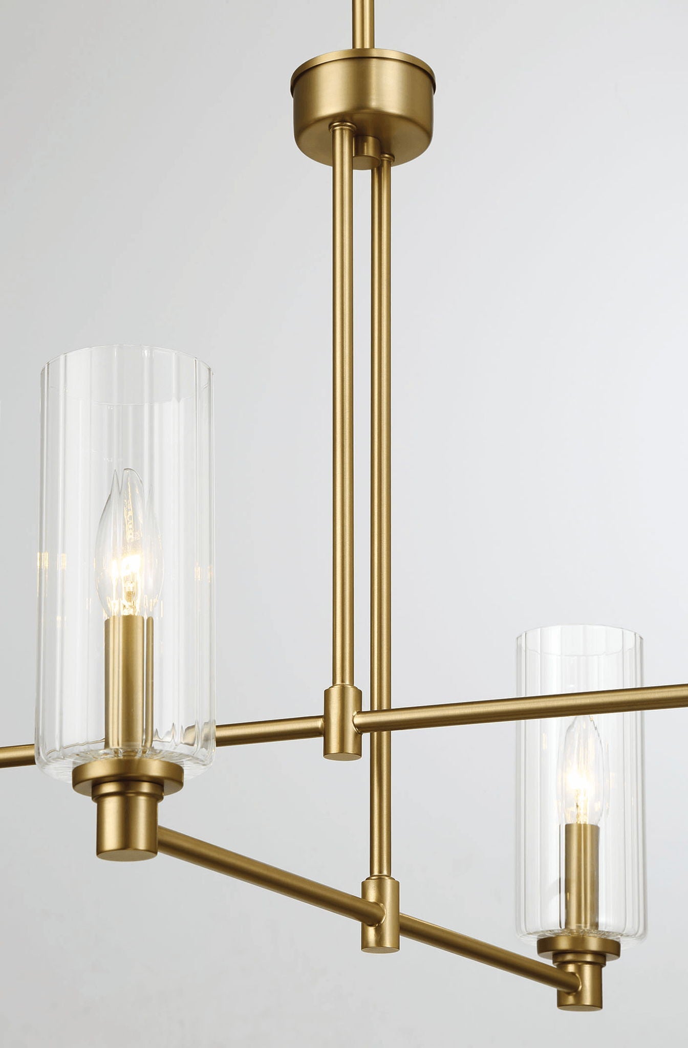 Enigma 4-light chandelier antique brass finish with clear ribbed glass shades on Tampa Home & Garden Store