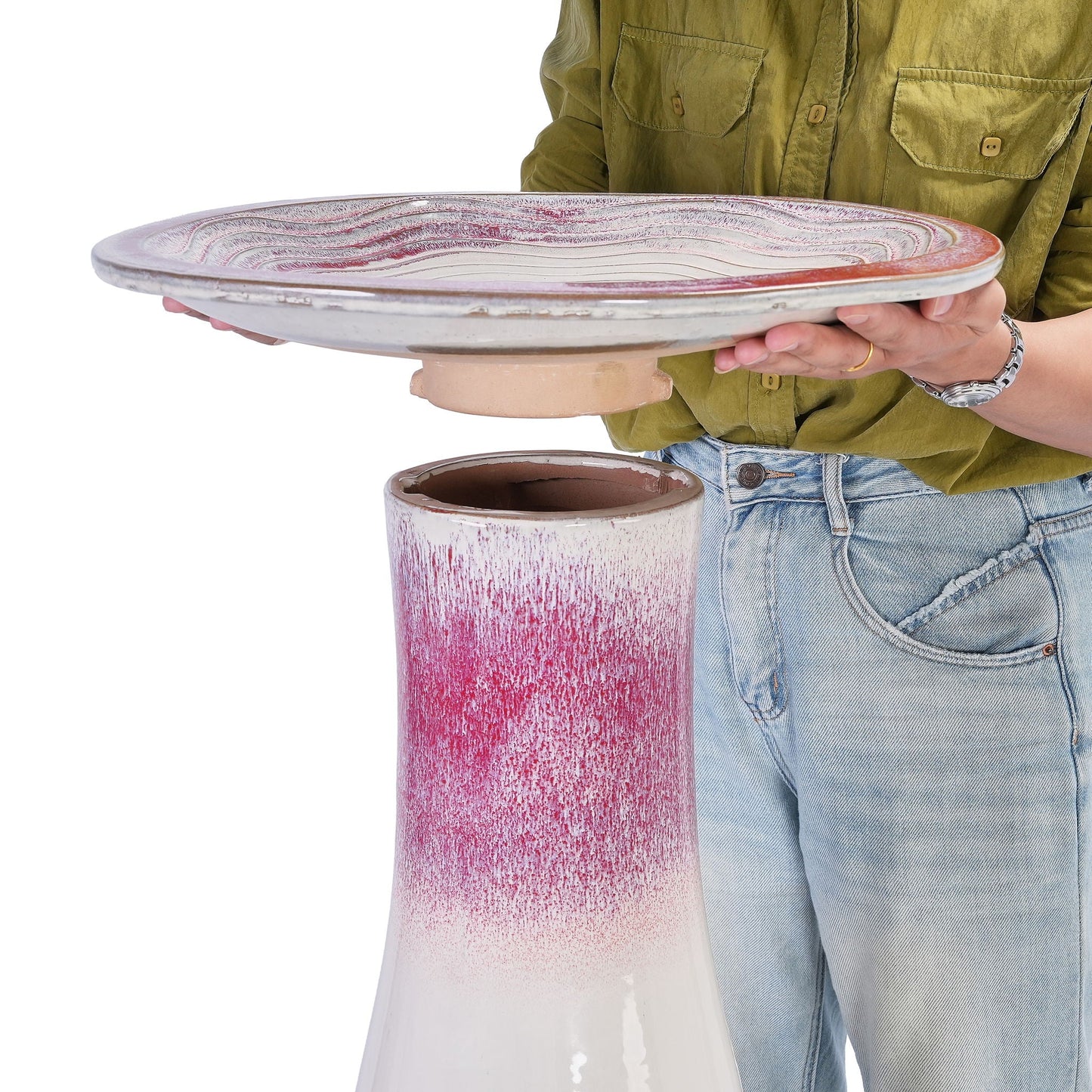 HouseOfZazla birdbath basin in white pink glaze, held by a person on Tampa Home & Garden Store