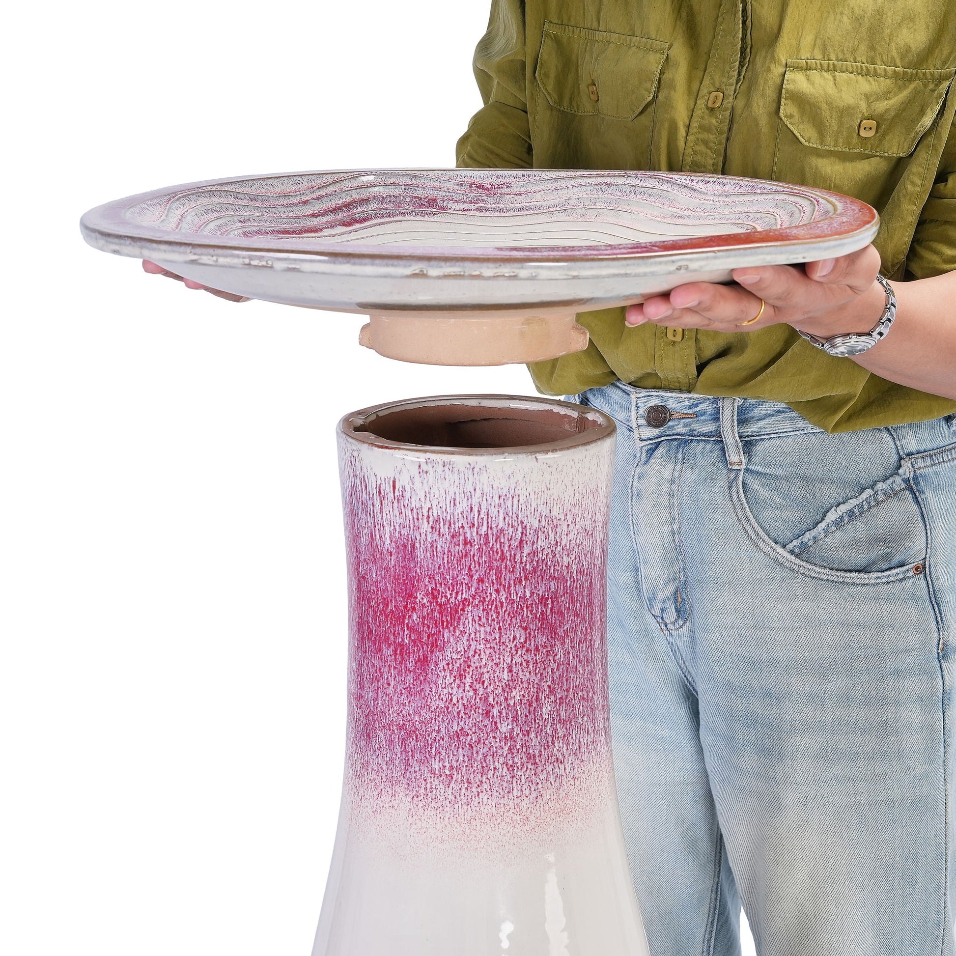 HouseOfZazla birdbath basin in white pink glaze, held by a person on Tampa Home & Garden Store