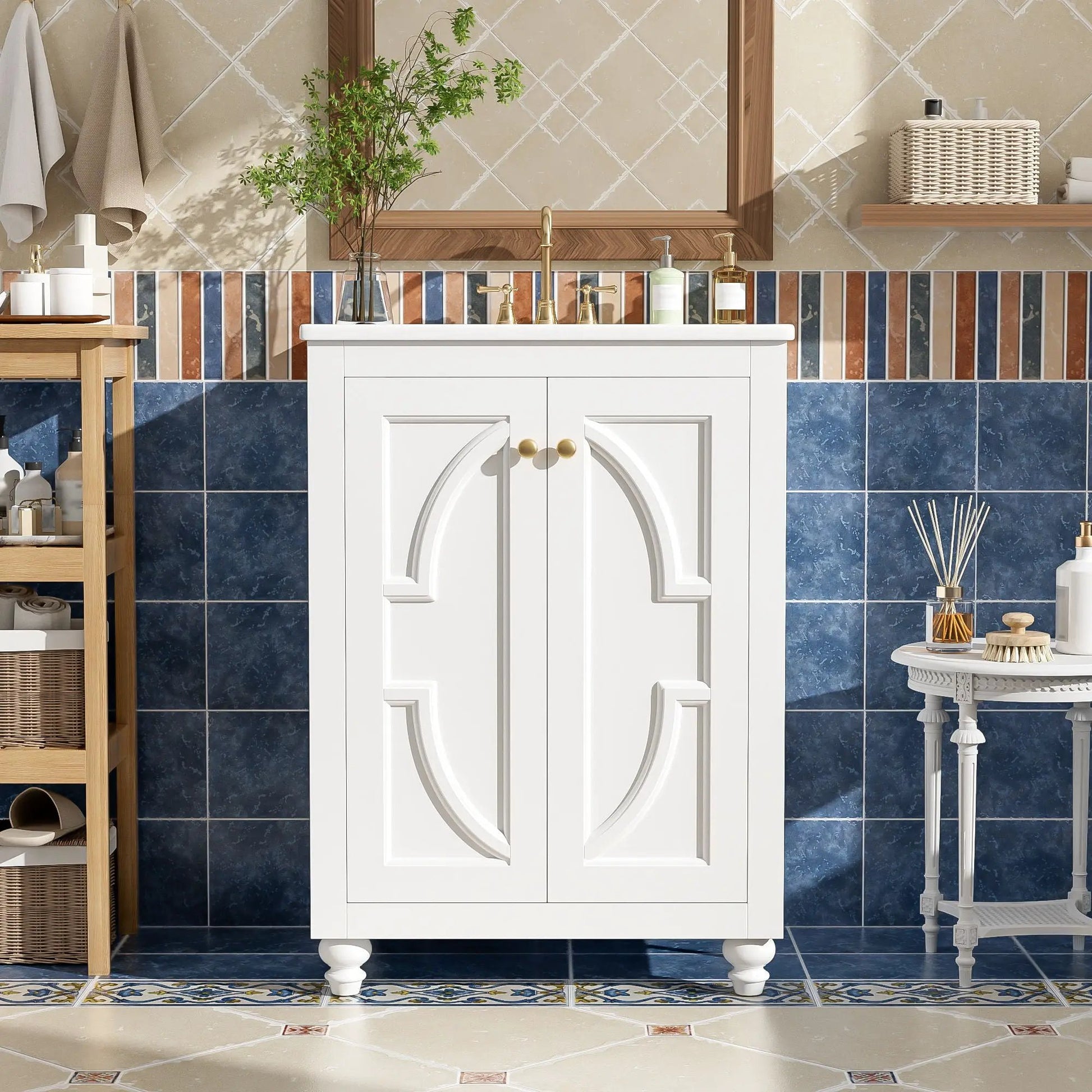 Bathroom vanity with ornate elliptical door panels, white finish, brass hardware and gold faucet on Tampa Home & Garden Store