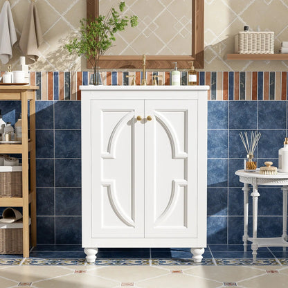 Bathroom vanity with ornate elliptical door panels, white finish, brass hardware and gold faucet on Tampa Home & Garden Store