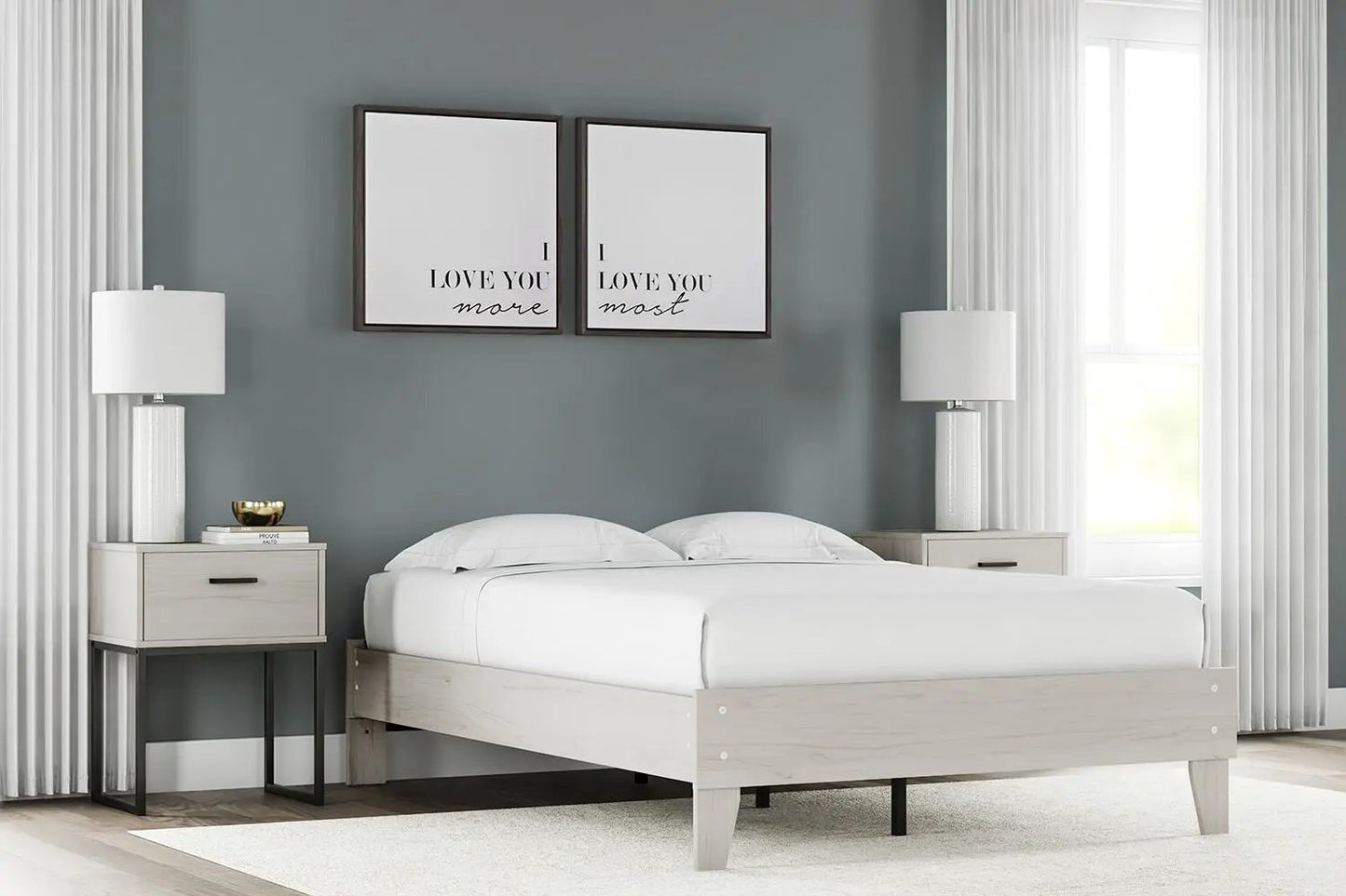Socalle Platform Bed by Unique Piece Furniture in light wood with white bedding and two nightstands on Tampa Home & Garden Store