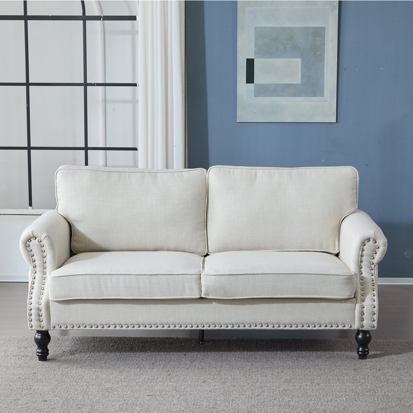 68 Inch faux leather rolled-arm sofa with nailhead trim in beige on Tampa Home & Garden Store
