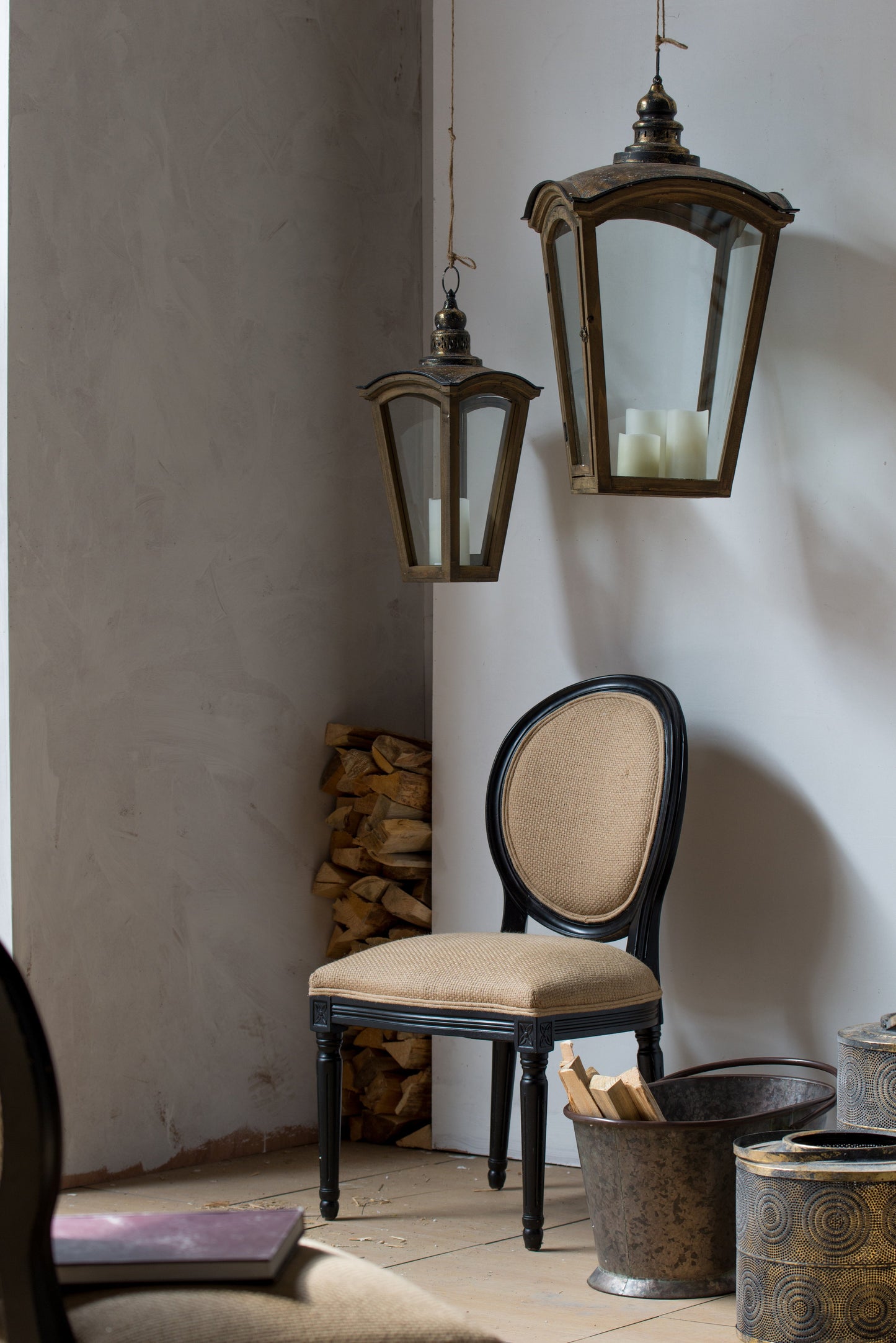 S/2 Coach House Lanterns, dark bronze wooden frames with glass panels and candle inserts on Tampa Home & Garden Store