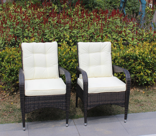 Three Liberatore outdoor dining chairs with beige cushions and dark wicker frames on Tampa Home & Garden Store