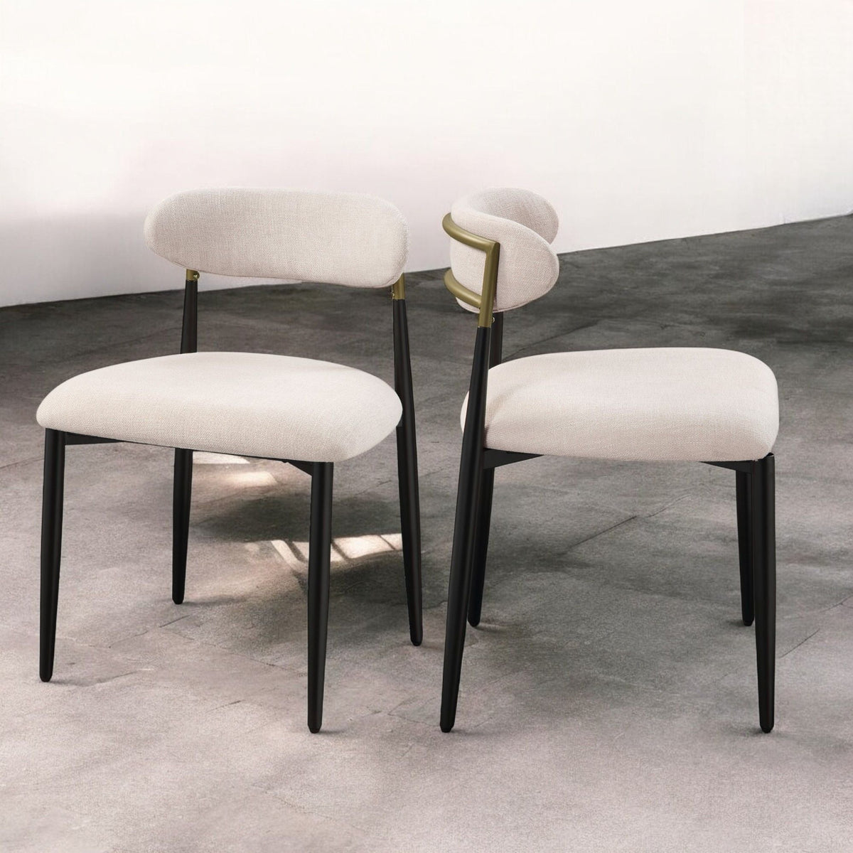 Side chair set: three beige padded chairs with black metal legs and gold curved armrests on Tampa Home & Garden Store