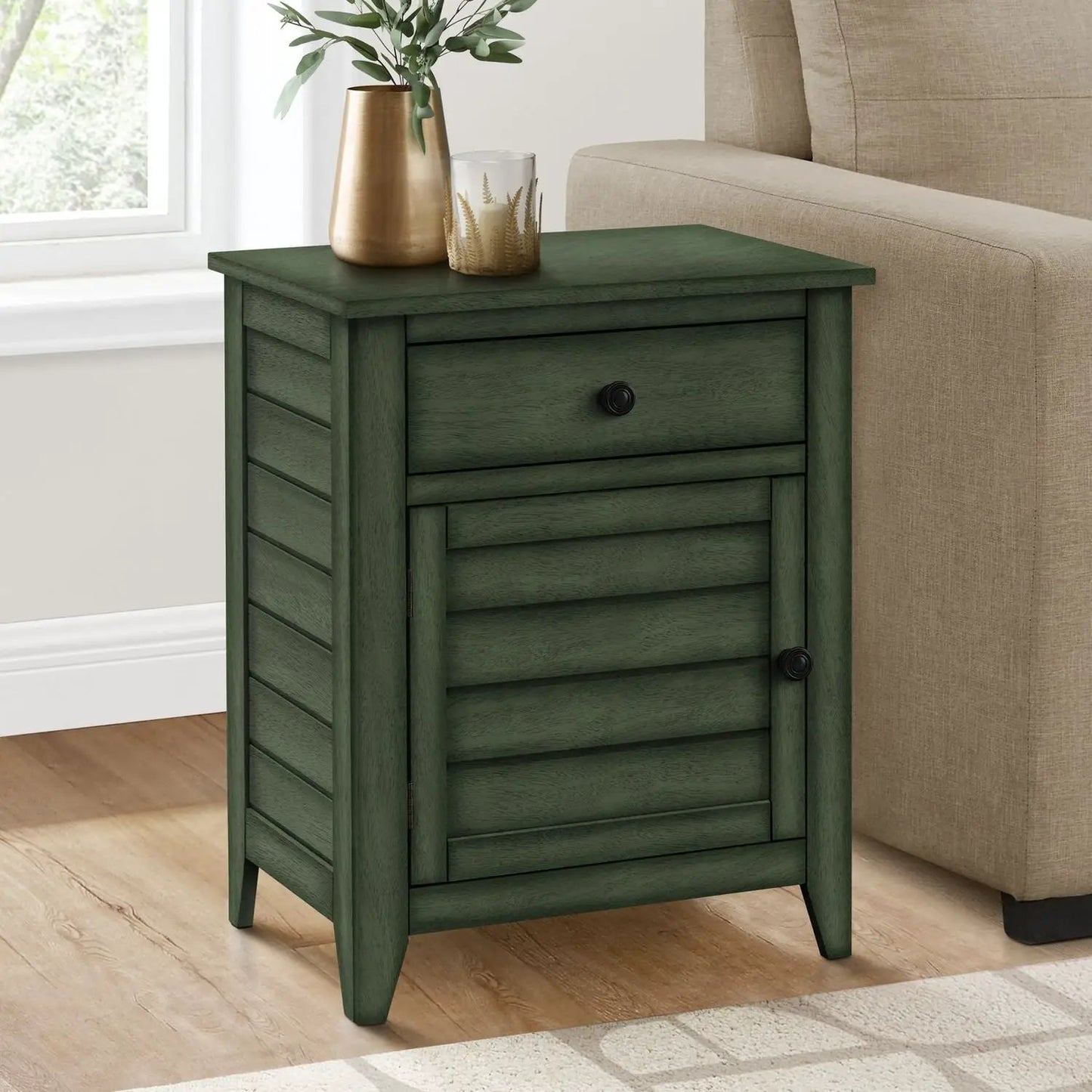 Accent nightstand with top drawer and louvered cabinet green wood finish beside beige sofa on Tampa Home & Garden Store