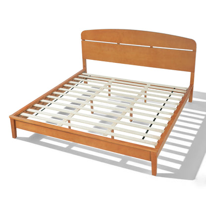 King size solid wood platform bed with curved headboard and slatted frame in warm brown on Tampa Home & Garden Store