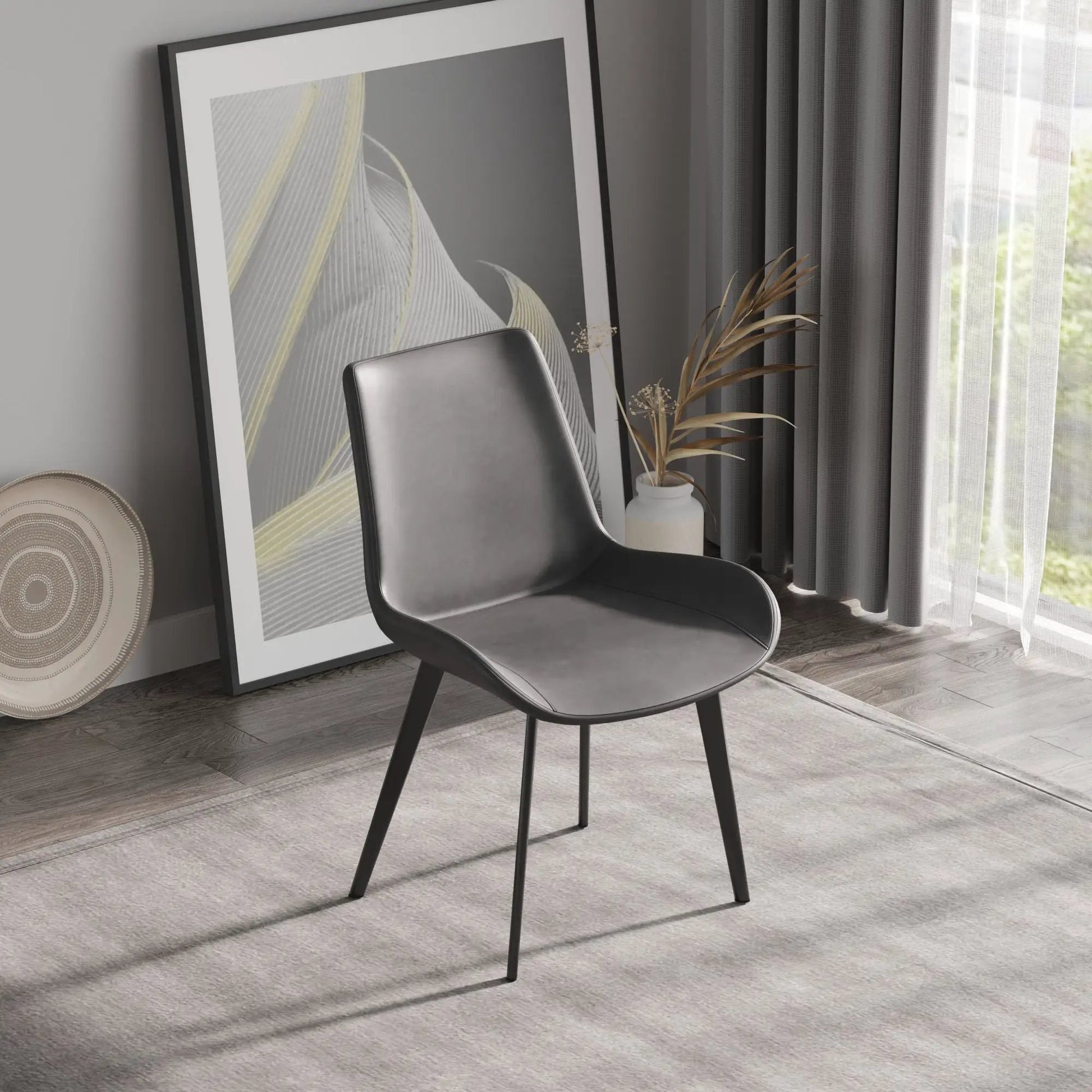 Modern dining chair set of 2 with black faux leather seat and slender metal legs on Tampa Home & Garden Store
