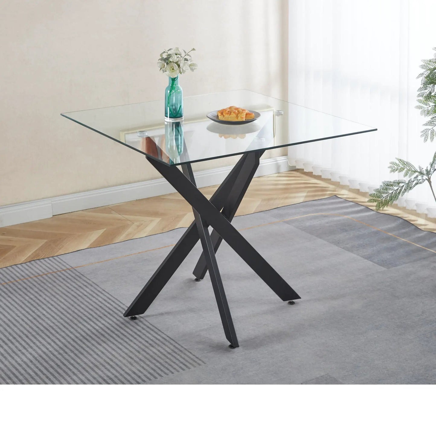 Dining table with cross metal legs and square tempered glass top on Tampa Home & Garden Store