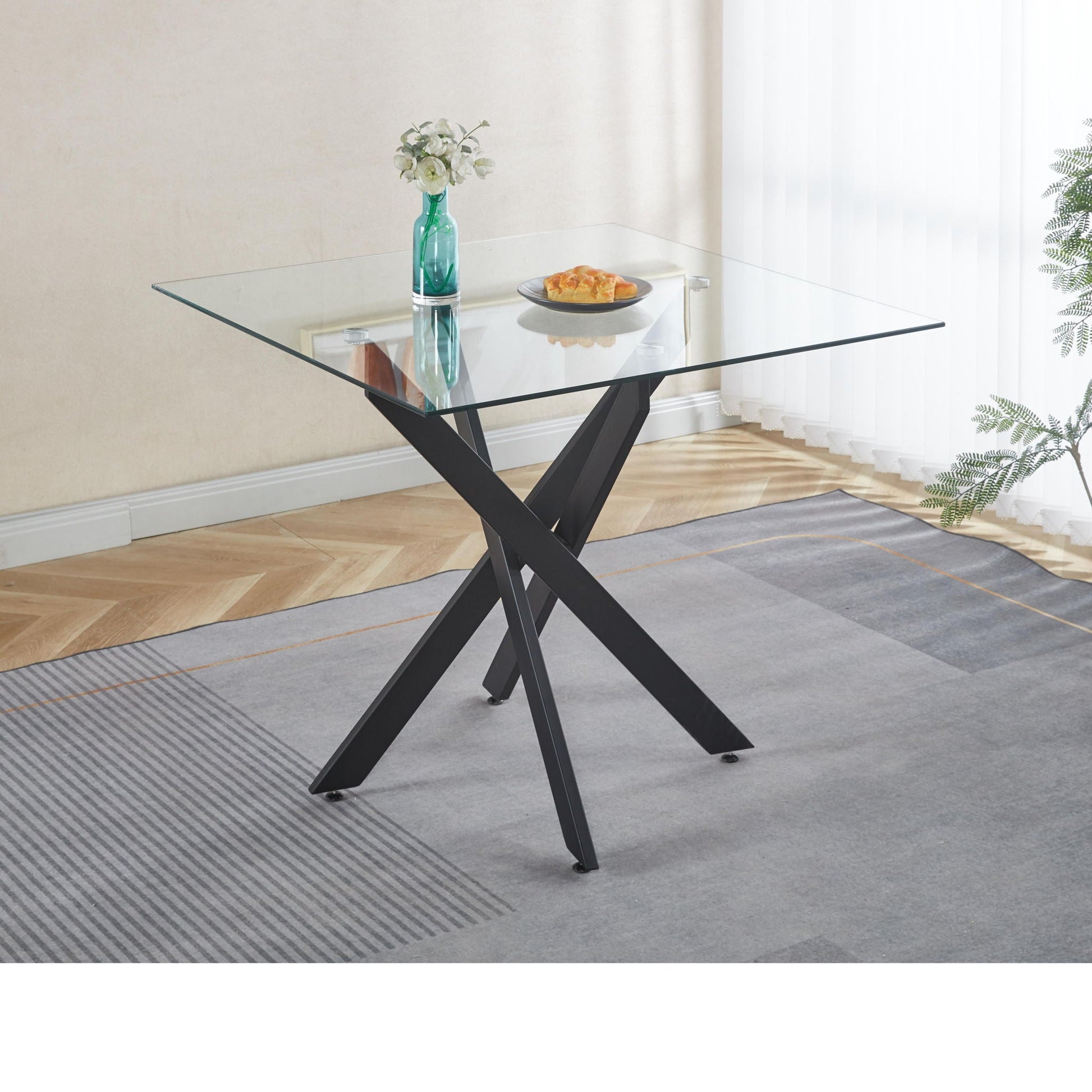 Dining table with tempered glass top and cross metal legs HouseOfZazla on Tampa Home & Garden Store
