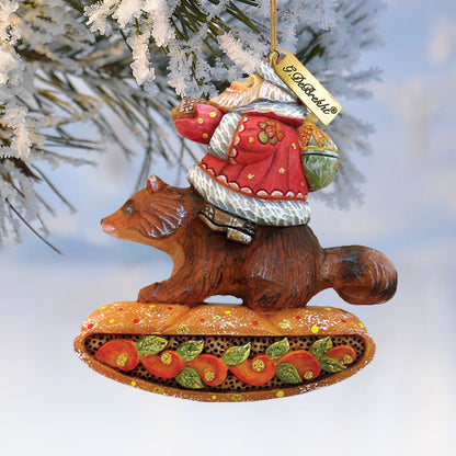 Santa on raccoon ornament by G. DeBrekht, red coat on brown raccoon with orange base on Tampa Home & Garden Store