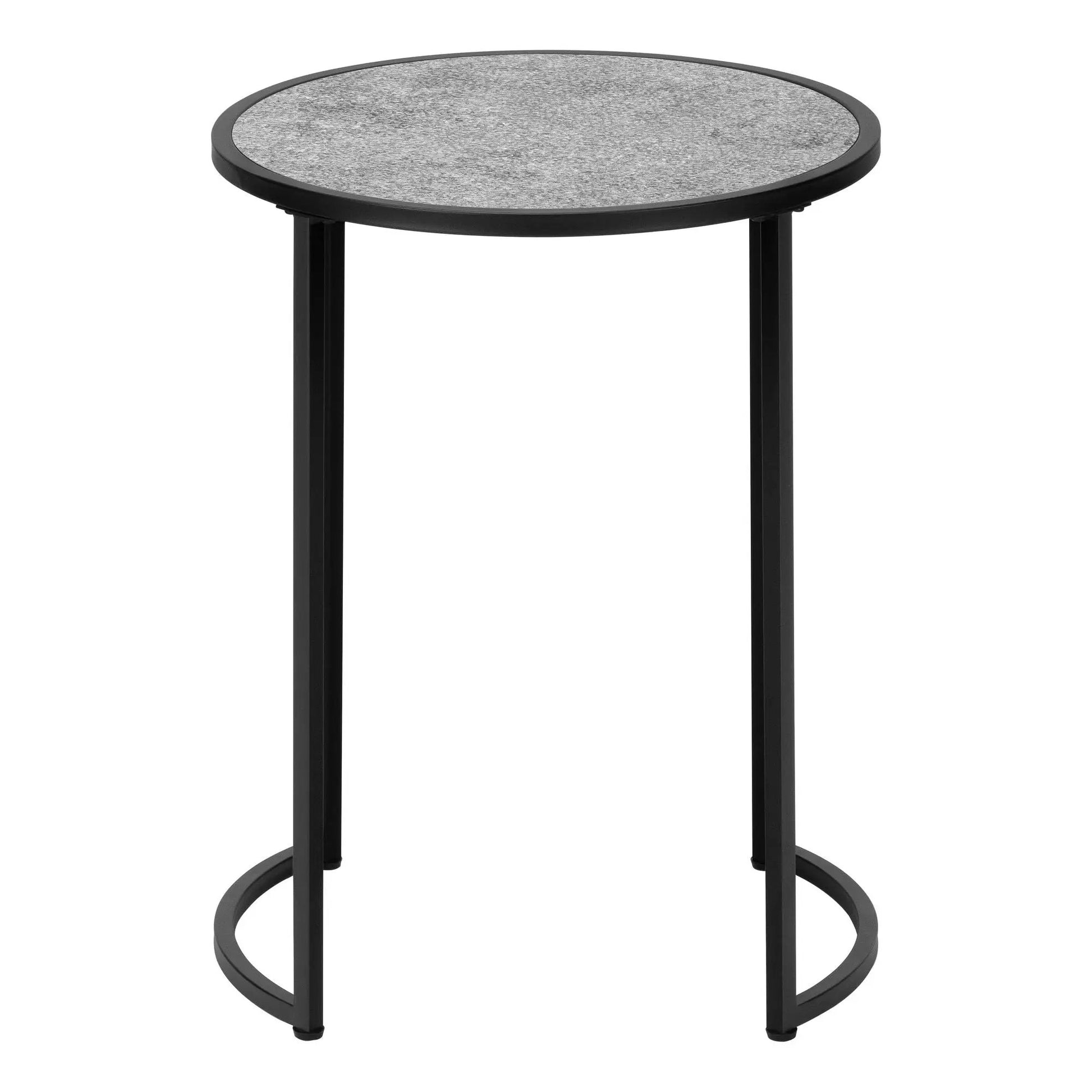 Round accent side table with a terrazzo gray top and black metal legs in a contemporary design on Tampa Home & Garden Store