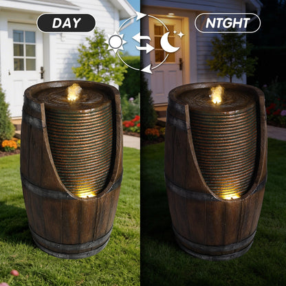 Outdoor Barrel Water Fountain with Rustic Wood Look Resin by HouseOfZazla, dual day/night views on Tampa Home & Garden Store