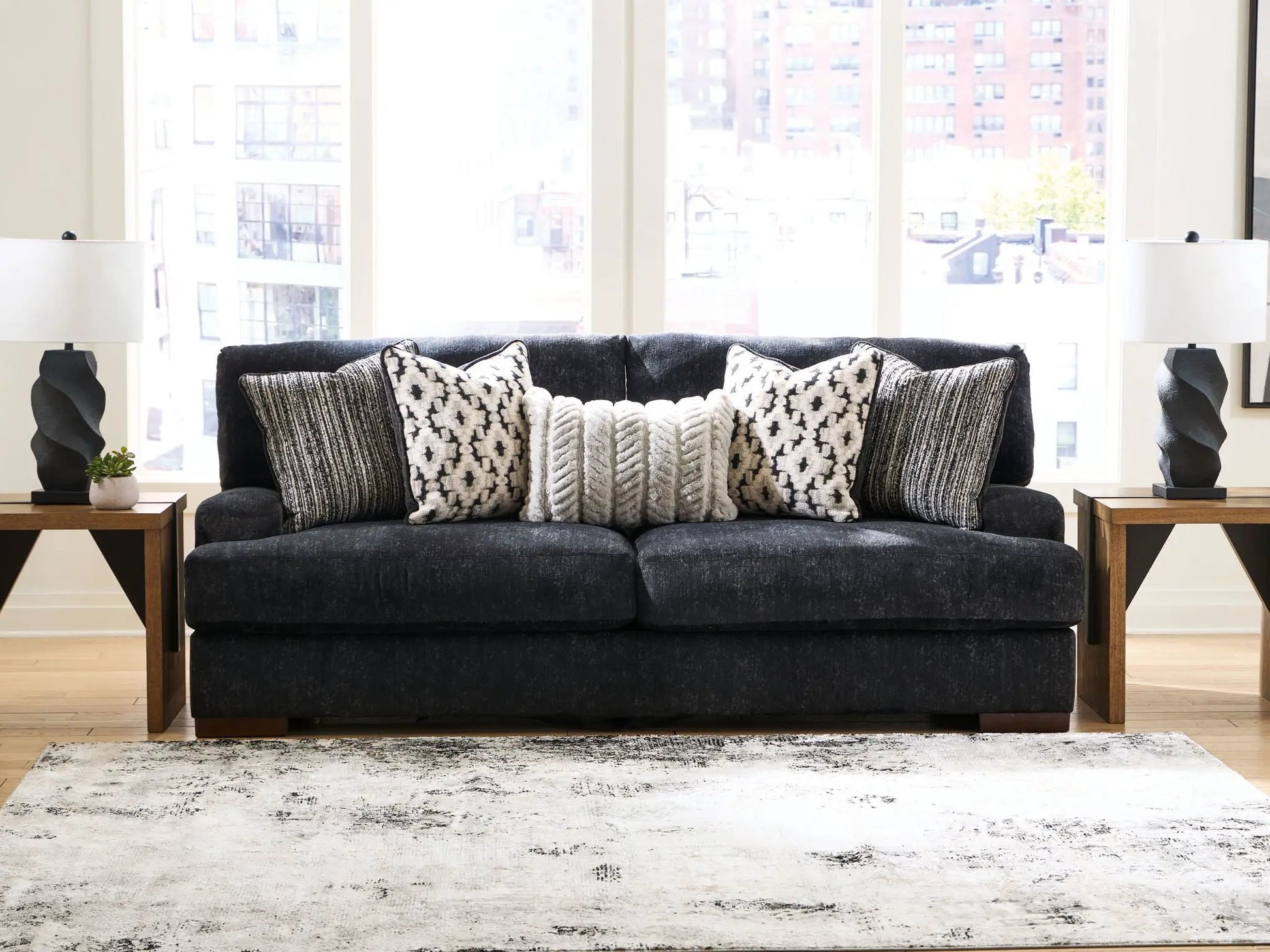 Whitmore Manor Sofa Black Pearl by Unique Piece Furniture, dark fabric with pillows, two lamps on Tampa Home & Garden Store