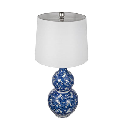 Two-tier blue and white ceramic vase lamp by HouseOfZazla with white shade on Tampa Home & Garden Store