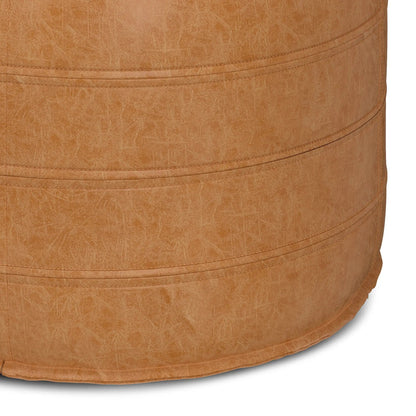 Brody Round Pouf by Unique Piece Furniture, tan leather-look with stitched bands on Tampa Home & Garden Store
