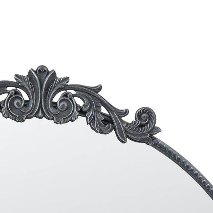 Wall mirror with Baroque-inspired dark gray metal frame and ornate scrollwork on Tampa Home & Garden Store