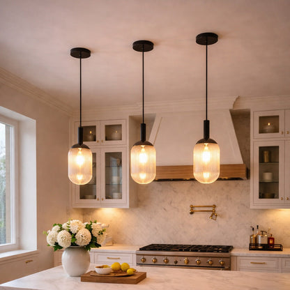 Giza Pendant Lamp trio with warm ribbed amber glass shades and black cords by HouseOfZazla on Tampa Home & Garden Store