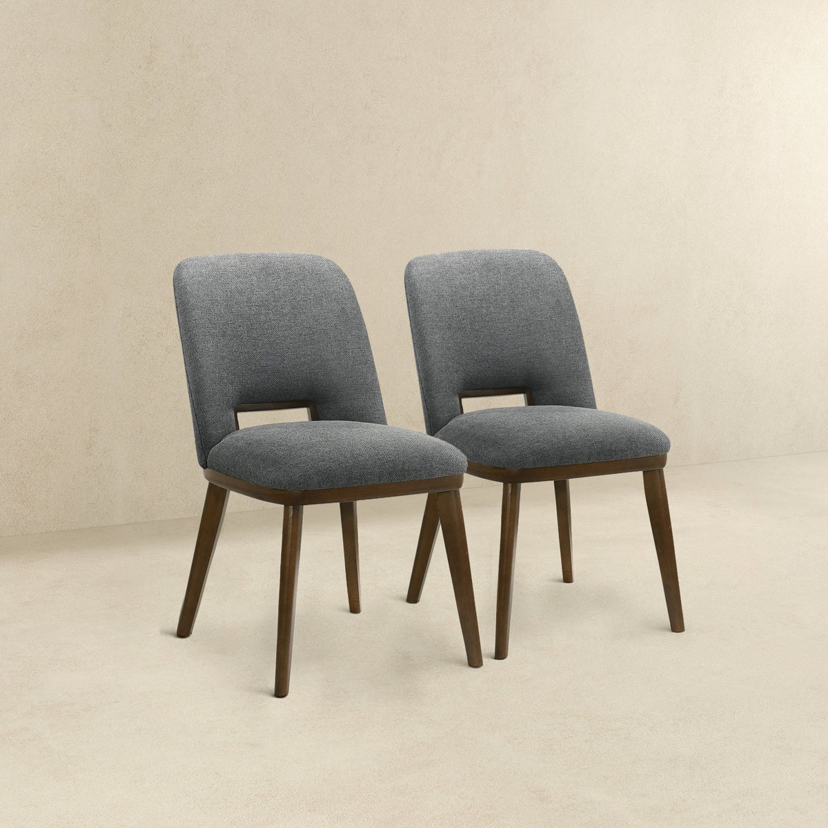 Set of 2 modern dining chairs with gray fabric upholstery and walnut base on Tampa Home & Garden Store