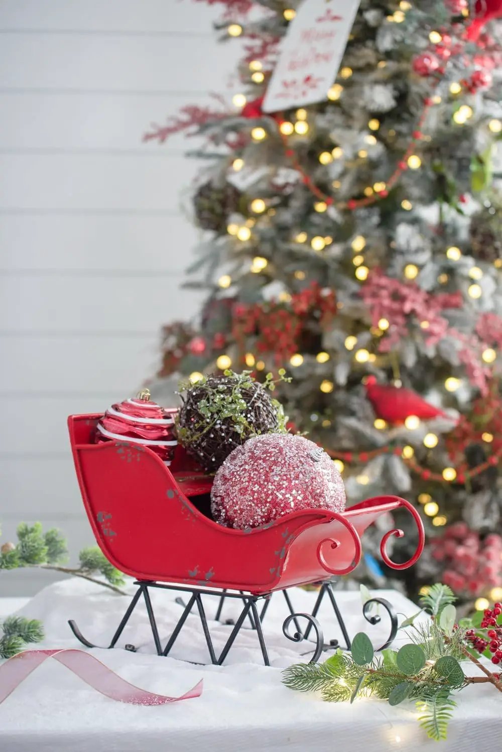 Iron Sleigh Large red distressed Christmas decoration with three ornaments on Tampa Home & Garden Store