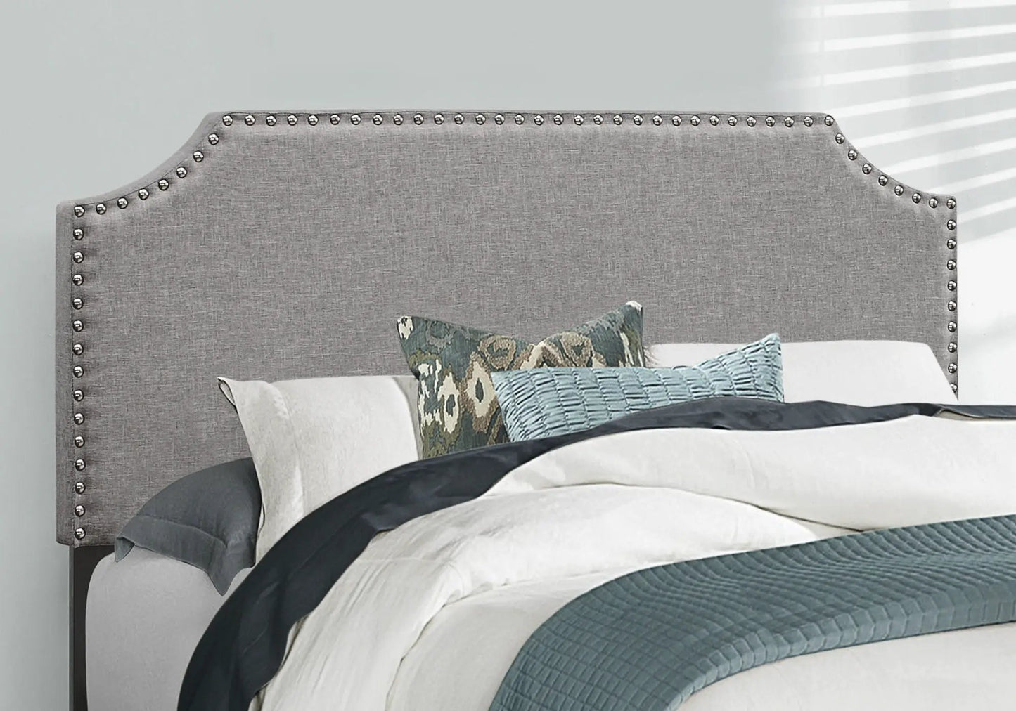 Bed upholstered in gray fabric with nailhead trim, transitional style by Unique Piece Furniture on Tampa Home & Garden Store