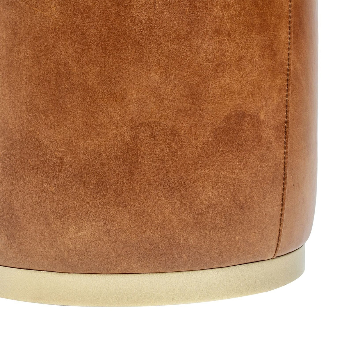 Brown leather round ottoman storage stool with brass base and textured surface on Tampa Home & Garden Store
