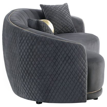 Luxe curved upholstered sofa with diamond quilting and gold trim in dark gray by HouseOfZazla on Tampa Home & Garden Store