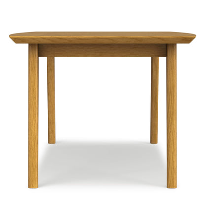 Rectangular dining table in light brown oak finish with visible grain HouseOfZazla dining tables on Tampa Home & Garden Store