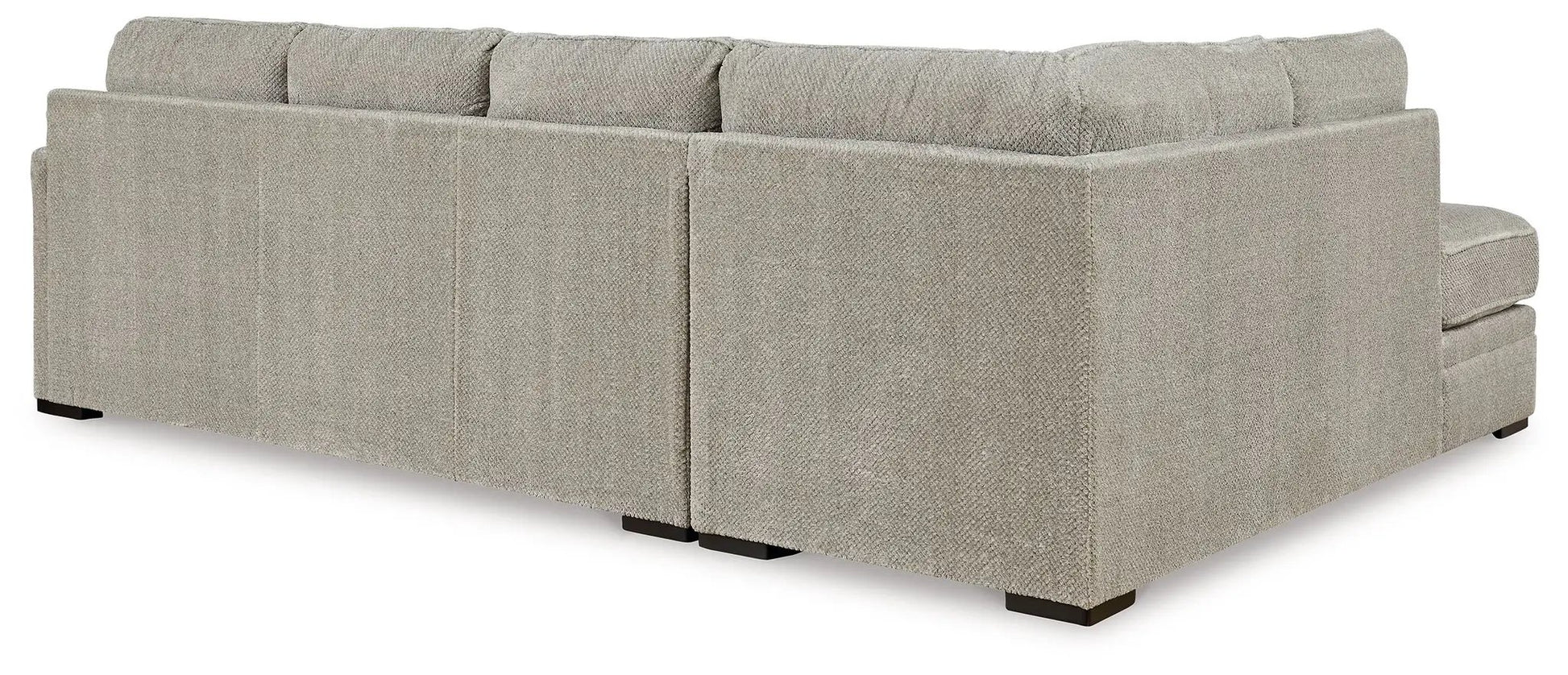 Calnita Sectional by Unique Piece Furniture in light gray boucle fabric with low-profile feet on Tampa Home & Garden Store