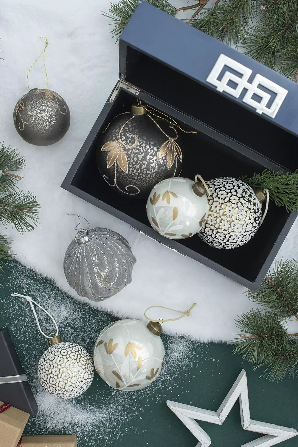Christmas ball ornaments set in silver, white and gold with botanical patterns in a black box on Tampa Home & Garden Store