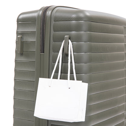 Green hard-shell luggage by HouseOfZazla 4-piece set with textured ridges on Tampa Home & Garden Store
