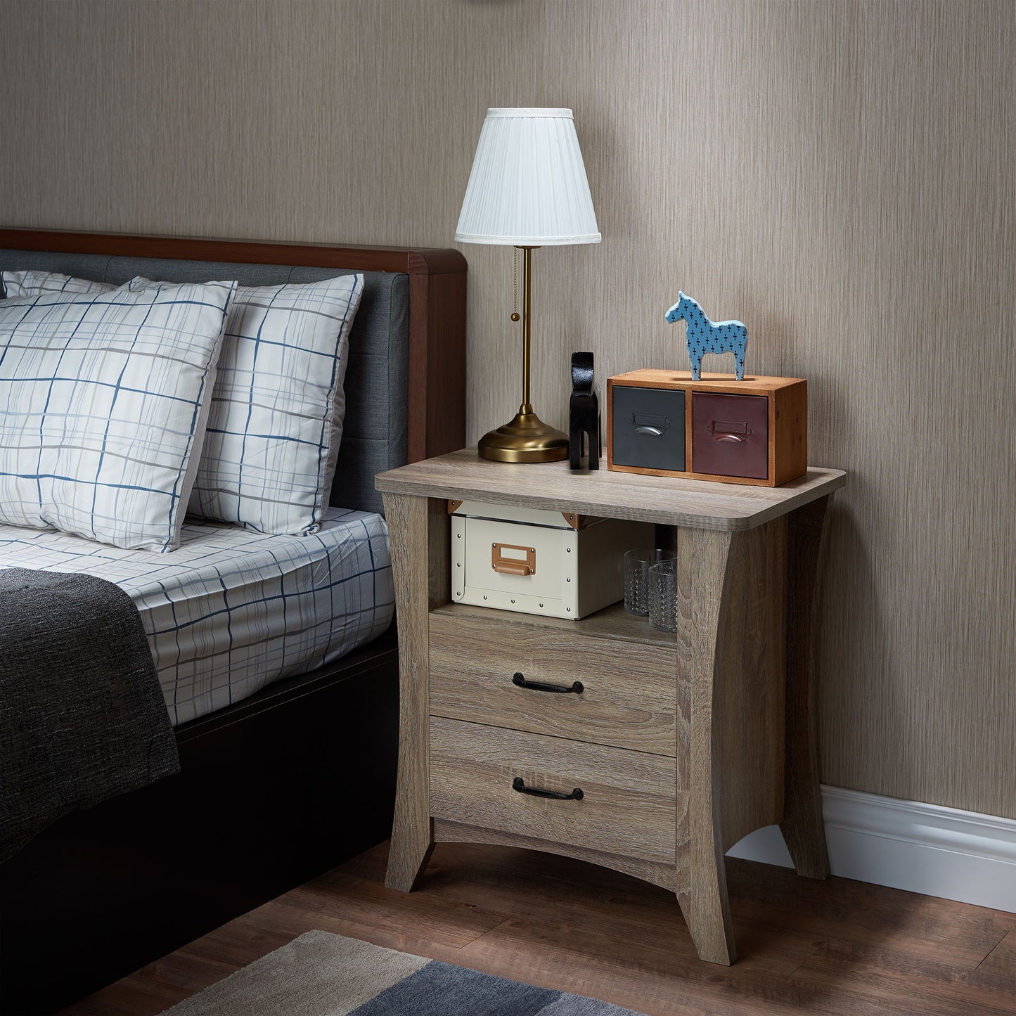 Colt Accent Table oak finish with 3-drawer storage beside bed and brass lamp on Tampa Home & Garden Store