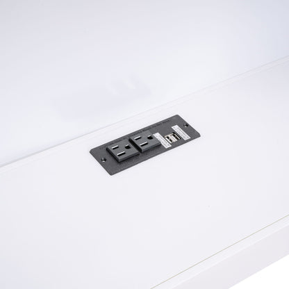 Black electrical outlet plate with USB ports and two outlets on white bed frame surface on Tampa Home & Garden Store
