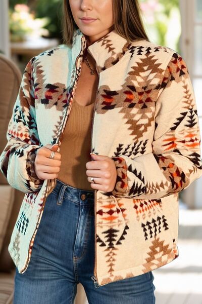Vintage zip-up mock-neck puffer jacket with cream aztec print on Tampa Home & Garden Store